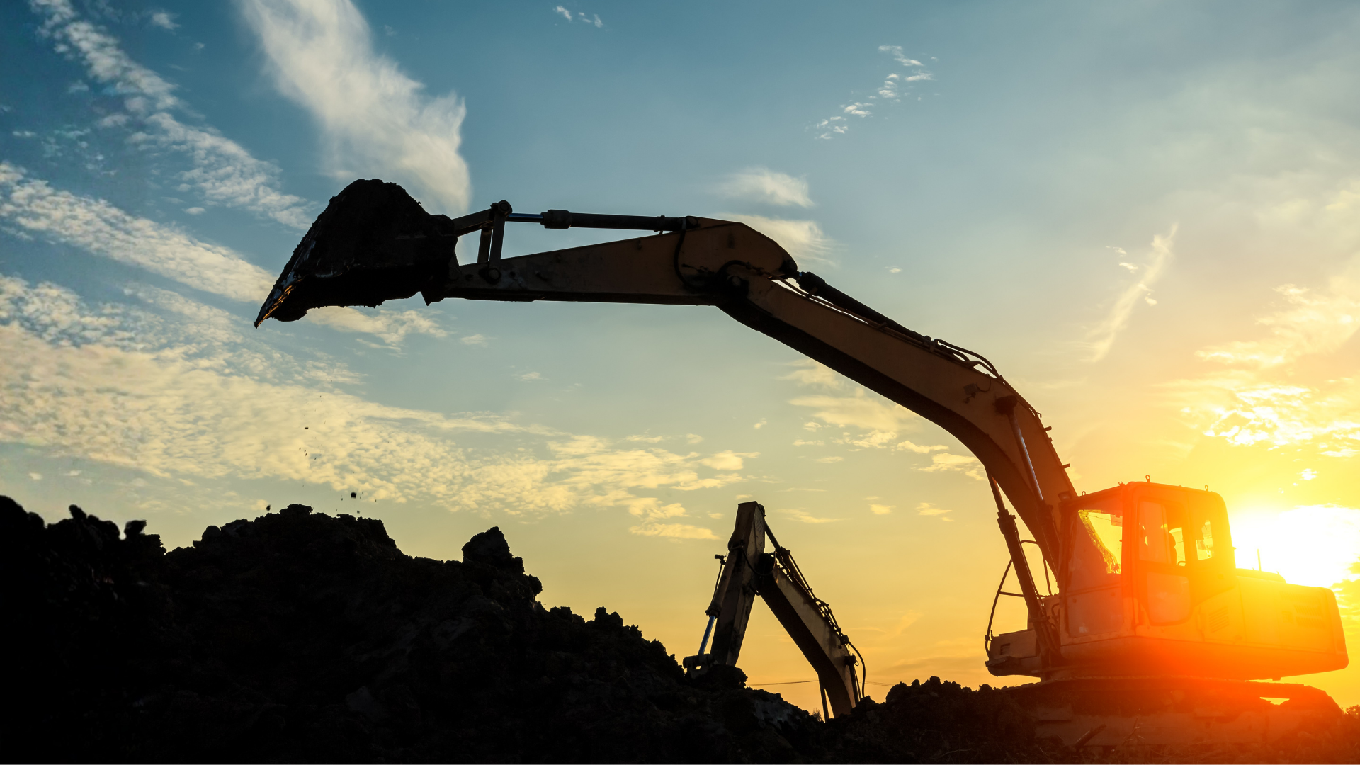 Excavator digging to install septic system